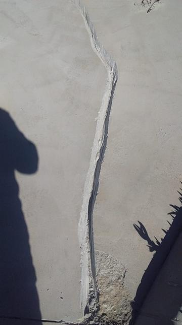 Sealed crack in a concrete yard